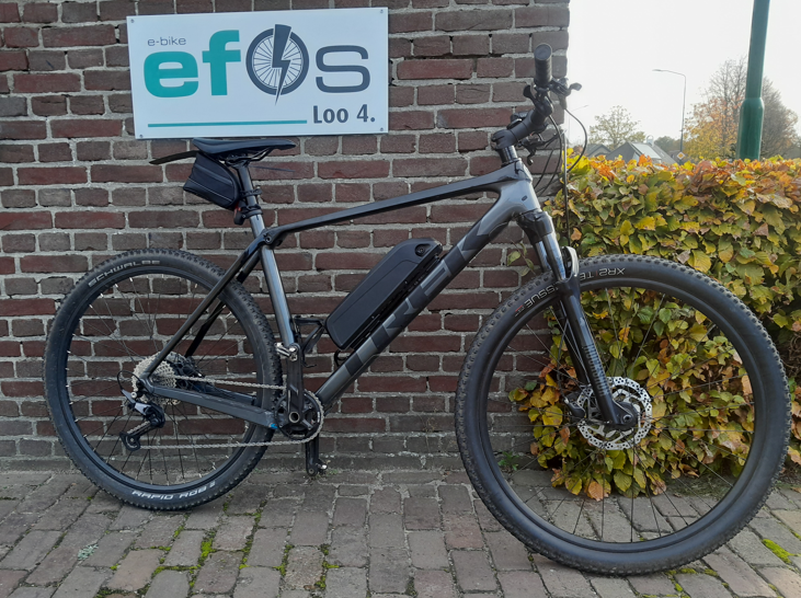 Trek Procaliber met achterwielmotor met steekas elektrisch gemaakt +40km/uur